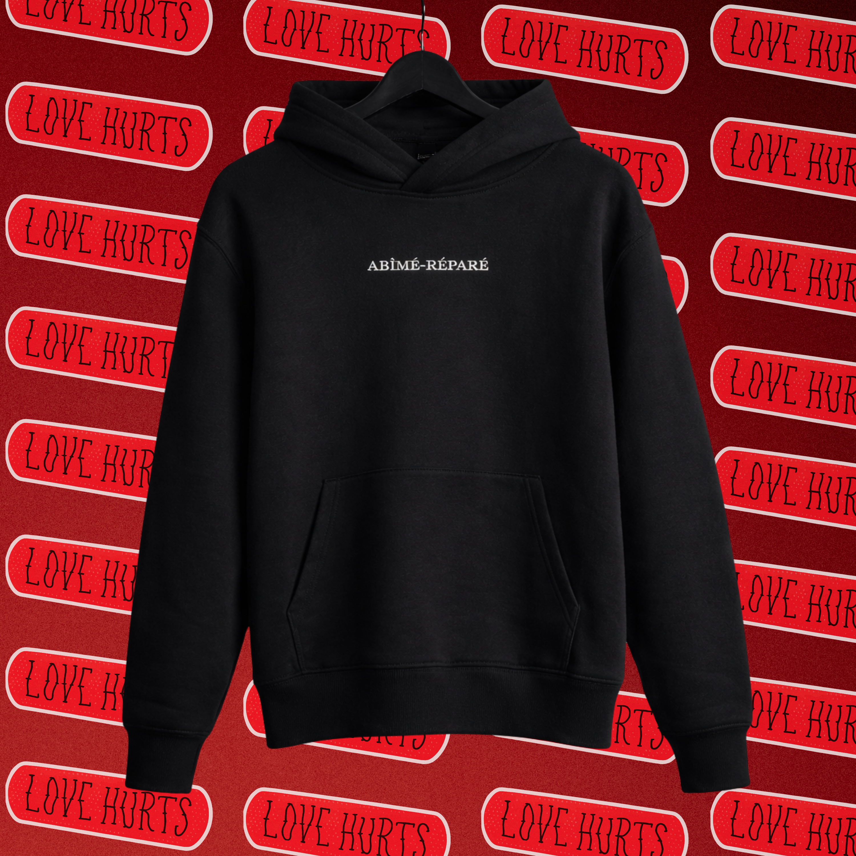 Sweat noir à capuche unisexe avec broderie "ABÎMÉ-RÉPARÉ"